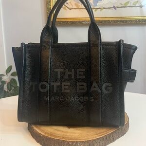 Marc Jacobs the tote bag 
Black Pebbled Leather